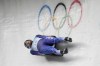 Jonathan Gustafson, of United States, slides during a luge men's run at the 2022 Winter Olympics, Saturday, Feb. 5, 2022, in the Yanqing district of Beijing. (AP Photo/Mark Schiefelbein)