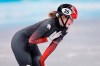 Canada's Kim Boutin reacts after winning the bronze medal in women's 500-metre short-track speedskating at the Beijing Winter Olympics in Beijing, China, on Monday, Feb. 7, 2022. THE CANADIAN PRESS/Paul Chiasson