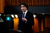 Prime Minister Justin Trudeau rises during an emergency debate in the House of Commons on the situation in Ottawa, as a protest against COVID-19 restrictions that has been marked by gridlock and the sound of truck horns continues into its second week, in Ottawa, Monday, Feb. 7, 2022. THE CANADIAN PRESS/Justin Tang