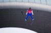 Taylor Fletcher, of the United States, soars through the air during a ski jumping training session in the Gundersen normal hill Nordic Combined event at the 2022 Winter Olympics, Monday, Feb. 7, 2022, in Zhangjiakou, China. (AP Photo/Matthias Schrader)