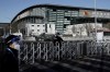 Chinese security stand guard outside the National Indoor Stadium ahead of the 2022 Winter Olympics, Wednesday, Feb. 2, 2022, in Beijing. THE CANADIAN PRESS/AP/Nariman El-Mofty