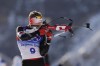 Scott Gow of Team Canada shoots during the men's 20-kilometer individual race at the 2022 Winter Olympics, Tuesday, Feb. 8, 2022, in Zhangjiakou, China. THE CANADIAN PRESS/AP/Kirsty Wigglesworth