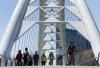 People cycle and walk along the lakeshore path along Lake Ontario in Toronto on Thursday, April 2, 2020. Canada's most populous province grew at a faster pace than the rest of Canada overall over the last five years, thanks largely to immigration. THE CANADIAN PRESS/Nathan Denette