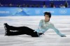 Yuzuru Hanyu, of Japan, falls in the men's free skate program during the figure skating event at the 2022 Winter Olympics, Thursday, Feb. 10, 2022, in Beijing. (AP Photo/Natacha Pisarenko)