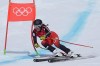 Marie-Michele Gagnon, of Canada makes a turn during the women's super-G at the 2022 Winter Olympics, Friday, Feb. 11, 2022, in the Yanqing district of Beijing. (AP Photo/Robert F. Bukaty)