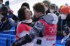 Gold medal winner Japan's Ayumu Hirano, left, gets congratulated by United States' Shaun White after the men's halfpipe finals at the 2022 Winter Olympics, Friday, Feb. 11, 2022, in Zhangjiakou, China. (AP Photo/Lee Jin-man)