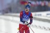 Johannes Thingnes Boe of Norway crosses the finish line during the men's 10-kilometer sprint competition at the 2022 Winter Olympics, Saturday, Feb. 12, 2022, in Zhangjiakou, China. (AP Photo/Kirsty Wigglesworth)