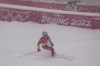 Marco Odermatt, of Switzerland finishing the first run of the men's giant slalom at the 2022 Winter Olympics, Sunday, Feb. 13, 2022, in the Yanqing district of Beijing. (AP Photo/Luca Bruno)