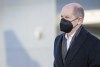 German Chancellor Olaf Scholz arrives at the airport in Berlin, Germany, Monday, Feb 14, 2022 . German Chancellor Olaf Scholz is flying to Ukraine on Monday and to Russia on Tuesday this week in an effort to help defuse escalating tensions between the countries. (Kay Nietfeld/dpa via AP)