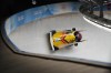 Francesco Friedrich and Thorsten Margis, of Germany, slide during the 2-man heat 2 at the 2022 Winter Olympics, Monday, Feb. 14, 2022, in the Yanqing district of Beijing. (AP Photo/Dmitri Lovetsky)
