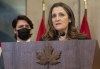 Canadian Prime Minister Justin Trudeau looks on as Deputy Prime Minister and Finance Minister Chrystia Freeland speaks during a news conference announcing the Emergencies Act will be invoked to deal with protests, Monday, February 14, 2022 in Ottawa. Trudeau says he has invoked the Emergencies Act to bring to an end antigovernment blockades he describes as illegal and not about peaceful protest. THE CANADIAN PRESS/Adrian WyldTHE CANADIAN PRESS/Adrian Wyld