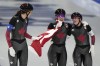 Team Canada, with Isabelle Weidemann left, Valerie Maltais center and Ivanie Blondin, react after wining the gold medal and setting an Olympic record in the speedskating women's team pursuit finals at the 2022 Winter Olympics, Tuesday, Feb. 15, 2022, in Beijing. THE CANADIAN PRESS/AP/Ashley Landis