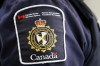 A Canada Border Services Agency patch is seen on an officer in Calgary on Aug. 1, 2019. THE CANADIAN PRESS/Jeff McIntosh