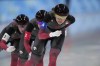 Team Canada, led by Isabelle Weidemann, with Valerie Maltais center and Ivanie Blondin, competes during the speedskating women's team pursuit semifinals at the 2022 Winter Olympics, Tuesday, Feb. 15, 2022, in Beijing. THE CANADIAN PRESS/AP/Sue Ogrocki