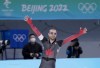 Canada's Laurent Dubreuil reacts after winning the silver medal in the menÕs 1,000 metre speedskating race at the 2022 Winter Olympics in Beijing on Friday, February 18, 2022. THE CANADIAN PRESS/Paul Chiasson