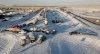 A truck convoy of anti-COVID-19 vaccine mandate demonstrators continue to block the highway at the busy U.S. border crossing in Coutts, Alta., Wednesday, Feb. 2, 2022. THE CANADIAN PRESS/Jeff McIntosh