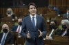 Prime Minister Justin Trudeau rises during Question Period in Ottawa, Monday, Feb. 21, 2022. THE CANADIAN PRESS/Adrian Wyld