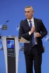 NATO Secretary General Jens Stoltenberg leaves the podium after addressing a media conference after a meeting of the NATO-Ukraine Commission at NATO headquarters in Brussels, Tuesday, Feb. 22, 2022. World leaders are getting over the shock of Russian President Vladimir Putin ordering his forces into separatist regions of Ukraine and they are focusing on producing as forceful a reaction as possible. Germany made the first big move Tuesday and took steps to halt the process of certifying the Nord Stream 2 gas pipeline from Russia. (AP Photo/Olivier Matthys)