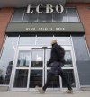 A person walks past an LCBO in Ottawa, Thursday March 19, 2020. The leader of Ontario's Liberal Party is asking the LCBO to stop selling Russian products following that country’s invasion of Ukraine. THE CANADIAN PRESS/Adrian Wyld