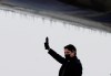 Canadian Prime Minister Justin Trudeau waves as he boards a government plane before departing for Europe, in Ottawa, Sunday, March 6, 2022. Trudeau is to meet with the leaders of the United Kingdom and the Netherlands today to discuss Russia's military invasion of Ukraine. THE CANADIAN PRESS/Adrian Wyld