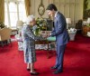 Britain's Queen Elizabeth II receives Canada's Prime Minister Justin Trudeau during an audience at Windsor Castle, Windsor, England, Monday March 7, 2022. (Steve Parsons/Pool via AP)