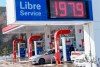 Motorists fill up at a gas station in Montreal on Tuesday, March 8, 2022. Gasoline costs across Canada are expected to keep rising Thursday, even after a significant mid-week dip in the price of oil. THE CANADIAN PRESS/Paul Chiasson