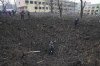 Ukrainian soldiers and emergency employees work at the side of the damaged by shelling maternity hospital in Mariupol, Ukraine, Wednesday, March 9, 2022. A Russian attack has severely damaged a maternity hospital in the besieged port city of Mariupol, Ukrainian officials say. (AP Photo/Evgeniy Maloletka)