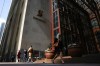 Pedestrians walk past Scotia Plaza in the financial district in Toronto on Wednesday, September 29, 2021. THE CANADIAN PRESS/Evan Buhler