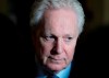 Former Quebec premier Jean Charest speaks with reporters as he arrives for an event with potential caucus supporters, in Ottawa, on Wednesday, March 2, 2022. THE CANADIAN PRESS/Justin Tang