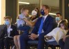 Peter MacKay, leadership candidate for the Conservative Party of Canada, and his wife Nazanin Afshin-Jam MacKay watch a broadcast show that will announce the party's new leader with their children Kian, 7, Valentia, 4, and Caledon, 2, in Ottawa on Sunday, Aug. 23, 2020. THE CANADIAN PRESS/Justin Tang