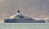 A view of Russian metals and petroleum magnate Roman Abramovich's superyacht Solaris anchored in Tivat, Montenegro, Saturday, March 12, 2022. President Joe Biden has warned Kremlin-aligned oligarchs that the U.S. and its European allies are coming for their superyachts. But actually seizing the behemoth vessels often worth hundreds of millions of dollars could prove challenging. Many of the boats are flagged and registered in secretive banking havens used by the ultra-rich to shield their wealth from taxes or seizures.  Abramovich's superyacht Solaris, stands eight stories tall, and features a sleek palisade of broad teak-covered decks suitable for hosting a horde of well-heeled partygoers. (AP Photo/Risto Bozovic)