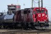 Canadian Pacific Railway trains sit idle on the train tracks due to the strike at the main CP Rail train yard in Toronto on Monday, March 21, 2022. Canadian Pacific Railway Ltd. and the union representing 3,000 conductors, engineers and train and yard workers say they have agreed to final and binding arbitration to end a work stoppage. THE CANADIAN PRESS/Nathan Denette