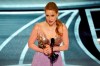 Jessica Chastain accepts the award for best performance by an actress in a leading role for 