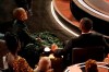 Jada Pinkett Smith, left, and Will Smith hold hands in the audience at the Oscars on Sunday, March 27, 2022, at the Dolby Theatre in Los Angeles. (AP Photo/Chris Pizzello)