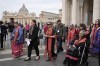 President of the Metis community, Cassidy Caron, second from left, and other delegates arrive to speak to the media in St. Peter's Square after their meeting with Pope Francis at the Vatican on Monday, March 28, 2022. THE CANADIAN PRESS/AP-Gregorio Borgia