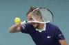 Daniil Medvedev of Russia returns a ball in his men's quarterfinal match against Hubert Hurkacz of Poland, at the Miami Open tennis tournament, Thursday, March 31, 2022, in Miami Gardens, Fla. (AP Photo/Rebecca Blackwell)