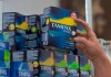 Tammy Compton restocks tampons at Compton's Market, Wednesday, June 22, 2016, in Sacramento, Calif. Advocates say that government should make menstrual products freely available for those who need them. NDP MP Leah Gazan, critic for women and gender equality, says they should be treated as an essential hygiene product, like toilet paper. (AP Photo/Rich Pedroncelli)