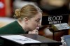 FILE - Nebraska State Sen. Megan Hunt of Omaha, is seen in the Legislative Chamber in Lincoln, Neb., Friday, March 1, 2019. Abortion supporters have scored a surprising victory in Nebraska, derailing a bill that would have automatically outlawed abortion if the U.S. Supreme Court ever overturns its decision to legalize the procedure. (AP Photo/Nati Harnik File)