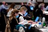 Journalists work in the media lockup, ahead of the tabling of the federal budget, in Ottawa, on Thursday, April 7, 2022. THE CANADIAN PRESS/Justin Tang