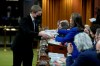 Finance Minister Chrystia Freeland handles a copy of the federal budget in the House of Commons in Ottawa, Thursday, April 7, 2022. THE CANADIAN PRESS/Adrian Wyld