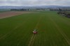 A farmer fertilizes a field on the outskirts of Frankfurt, Germany, Monday, April 4, 2022. Russia's war in Ukraine has pushed up fertilizer prices that were already high, made scarce supplies rarer still and squeezed farmers. (AP Photo/Michael Probst)