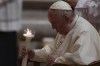 Pope Francis holds a Paschal candle as he presides over an Easter vigil ceremony in St. Peter's Basilica at the Vatican on Saturday, April 16, 2022. A Métis group from Manitoba was flying to Rome on Monday ahead of a meeting with Pope Francis at the Vatican on Thursday. THE CANADIAN PRESS/AP /Alessandra Tarantino