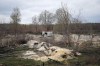 Trenches and firing positions sit in the highly radioactive soil adjacent to the Chernobyl nuclear power plant near Chernobyl, Ukraine, Saturday, April 16, 2022. Thousands of tanks and troops rumbled into the forested exclusion zone around the shuttered plant in the earliest hours of Russia’s invasion of Ukraine in February, churning up highly contaminated soil from the site of the 1986 accident that was the world's worst nuclear disaster. (AP Photo/Efrem Lukatsky)