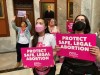 FILE - Abortion-rights supporters chant their objections at the Kentucky Capitol on Wednesday, April 13, 2022, in Frankfort, Ky., as Kentucky lawmakers debate overriding the governor's veto of an abortion measure.  Frustration is building among abortion rights groups in Kentucky, where a restrictive new law has thrown the state’s only two remaining clinics into limbo. For women seeking abortions, it means traveling elsewhere or waiting for a judge to rule on requests to block the law. AP Photo/Bruce Schreiner, File)