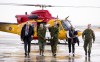 CFL Commissioner Randy Ambrosie, left, Edmonton Eskimos alumni Henry Williams, second from right and Brigadier General Trevor Cadieu, right look on as the Grey Cup arrives at Canadian Forces Base Edmonton, Alta. Tuesday, Nov. 20, 2018. THE CANADIAN PRESS/Jonathan Hayward