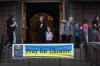 Parishioners walk in procession around the church, Friday, April 22, 2022, during a Good Friday service at St. Mary's Ukrainian Orthodox Cathedral in Allentown, Pa.. While Easter is the most joyous of holy days on the church calendar, marking the day Christians believe Jesus triumphed over death, many members of Ukrainian Orthodox churches across the United States are finding it difficult to summon joy at a time of war. (AP Photo/Wong Maye-E)