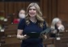 Conservative MP Stephanie Kusie rises during Question Period in the House of Commons Tuesday March 9, 2021 in Ottawa. THE CANADIAN PRESS/Adrian Wyld