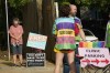 Longtime anti-abortion activist Barbara Beavers, left, prays as she waits by the entrance to the Jackson Women's Health Organization (JWHO), Mississippi's last remaining abortion clinic parking lot, to hand out pro-life materials to an incoming patients, Tuesday, May 3, 2022, in Jackson, Miss. Clinic escorts stand on the other side of the entrance to direct and deflect any interference from anti-abortion protestors. (AP Photo/Rogelio V. Solis)