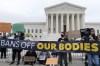 Demonstrators protest outside of the U.S. Supreme Court Tuesday, May 3, 2022 in Washington. A draft opinion suggests the U.S. Supreme Court could be poised to overturn the landmark 1973 Roe v. Wade case that legalized abortion nationwide, according to a Politico report released Monday. Whatever the outcome, the Politico report represents an extremely rare breach of the court's secretive deliberation process, and on a case of surpassing importance. (AP Photo/Jose Luis Magana)