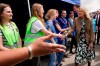 First lady Jill Biden visits with volunteers and first responders during a visit to Vysne Nemecke, Slovakia, near the border with Ukraine, Sunday, May 8, 2022. Slovakia's Prime Minister Eduard Heger is behind Biden. (AP Photo/Susan Walsh, Pool)